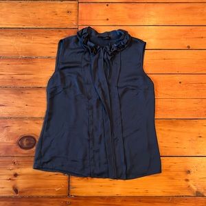 Blue sleeveless top with ruffles. Size medium.
